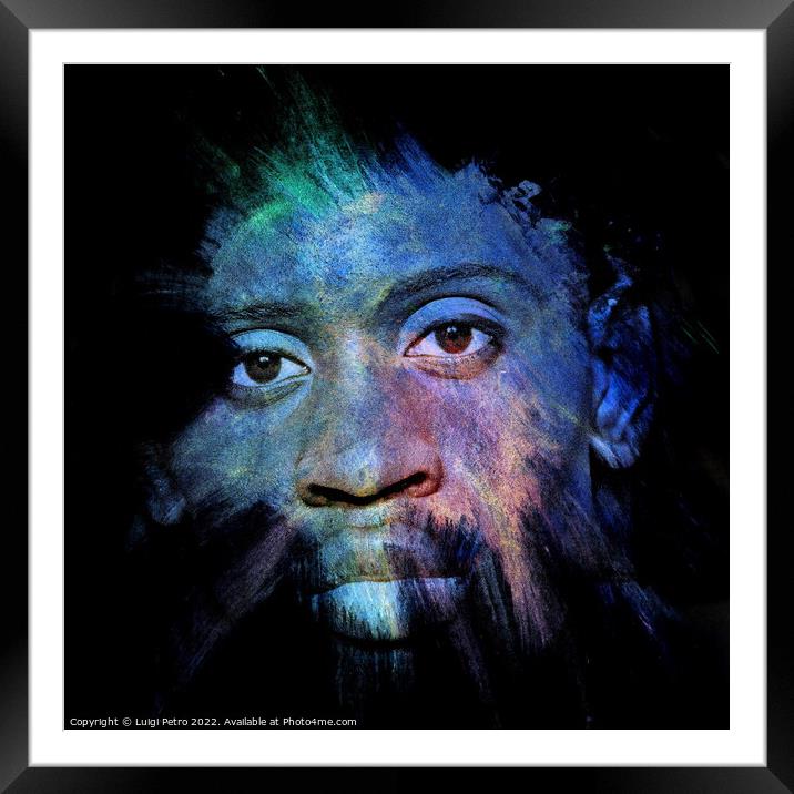 Young black man staring out of the dark. Framed Mounted Print by Luigi Petro