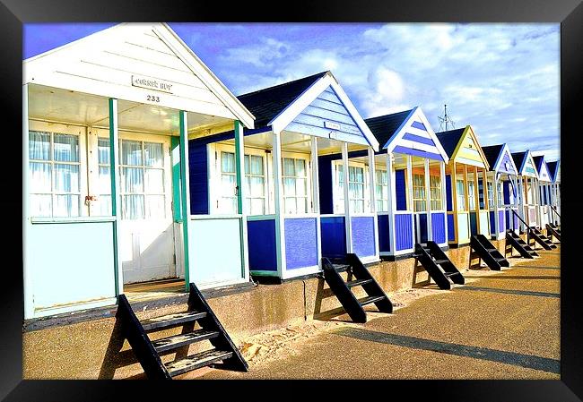  Southwold bright beach huts Framed Print by Sue Bottomley