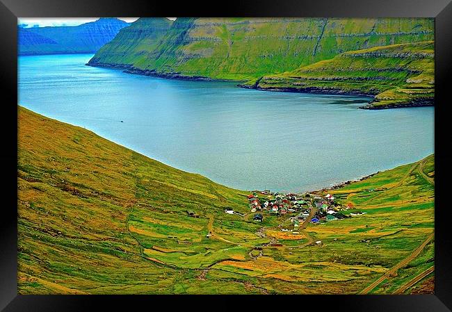 Mountains and small village in the Faroe Islands Framed Print by Sue Bottomley