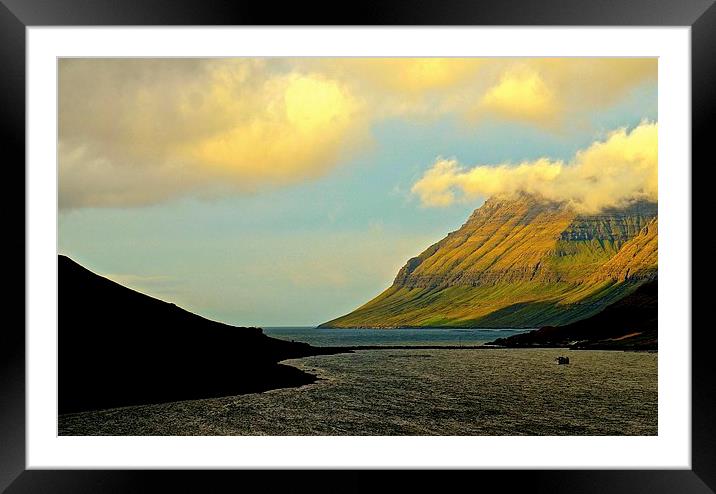 Leaving the Faroe Islands by sea  Framed Mounted Print by Sue Bottomley