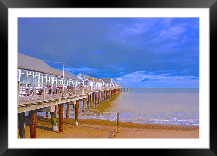 Southwold Pier, beach and sea  Framed Mounted Print by Sue Bottomley