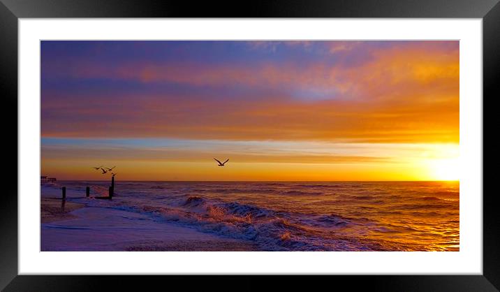 Sunrise over Southwold beach in Suffolk            Framed Mounted Print by Sue Bottomley