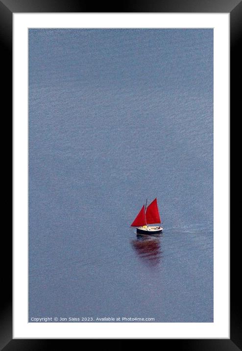 boat with red sails Framed Mounted Print by Jon Saiss