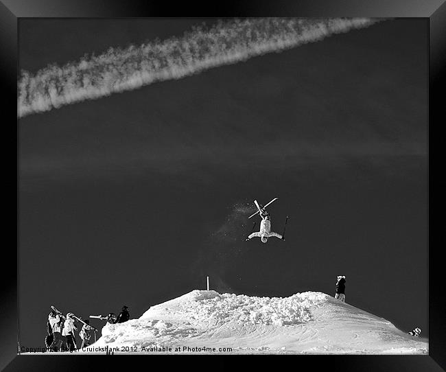 Inverted Cross Up Freestyle Skier Framed Print by Roger Cruickshank