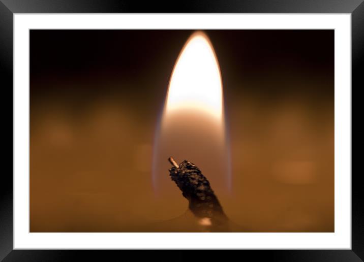Candle wick Framed Mounted Print by James Woodward
