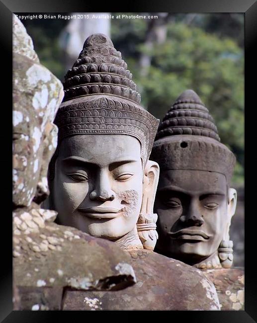  Angkor Temple Entrance Statue Heads Framed Print by Brian  Raggatt