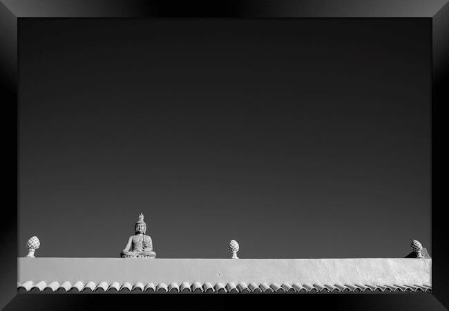 Buddha figure on roof Framed Print by Phil Crean