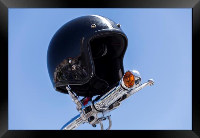 Crash helmet on handlebars Framed Print by Phil Crean