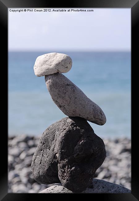 Stone cairn, rocks perched on beach, Tenerife Framed Print by Phil Crean