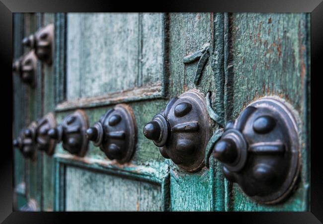 Studs on the door to Cusco cathedral, Peru Framed Print by Phil Crean