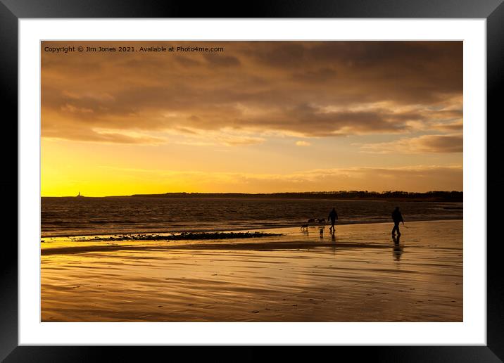 Dog walkers on the beach at sunrise Framed Mounted Print by Jim Jones
