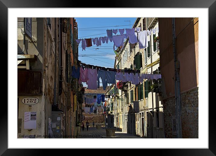 Venetian street on washing day Framed Mounted Print by Jim Jones