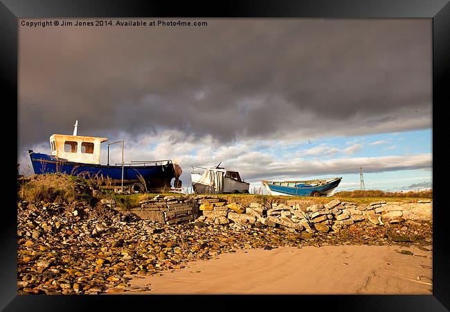  Boatyard under threatening sky Framed Print by Jim Jones