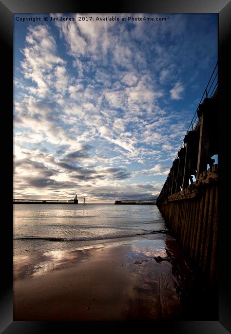 Early morning between the piers Framed Print by Jim Jones