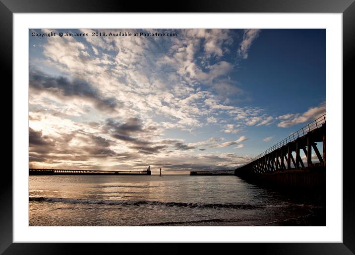 Early morning between the piers. Framed Mounted Print by Jim Jones