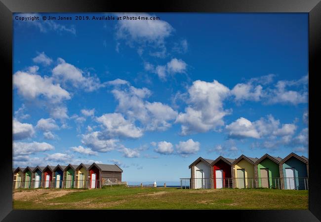 Colourful beach huts at Blyth Framed Print by Jim Jones