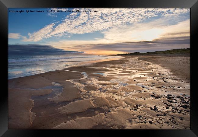 Morning sky reflected on the beach. Framed Print by Jim Jones