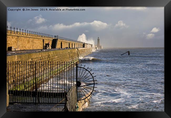 Waves crashing over Tynemouth Pier. Framed Print by Jim Jones