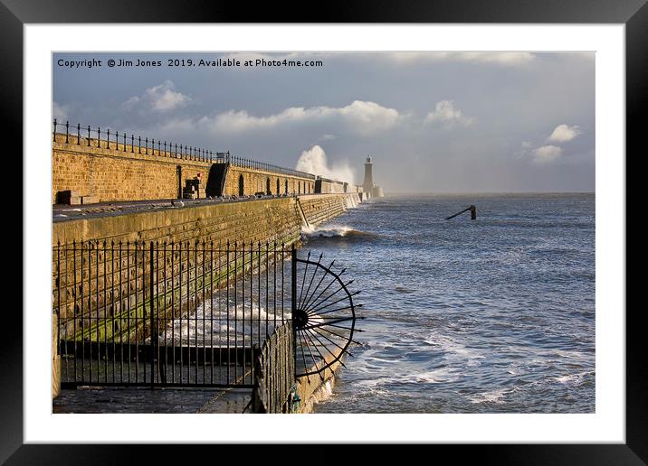 Waves crashing over Tynemouth Pier. Framed Mounted Print by Jim Jones