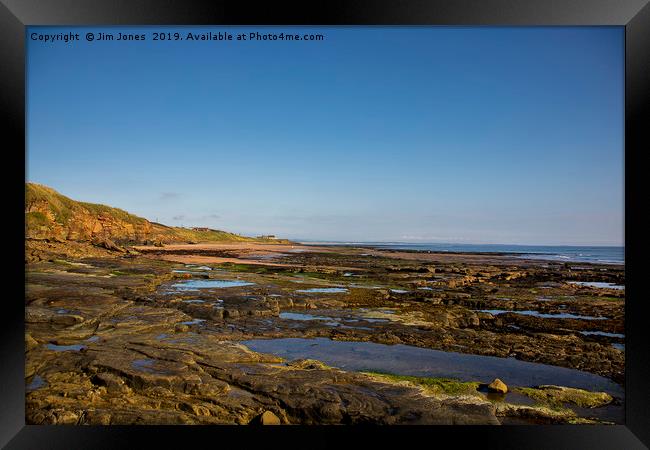 Rocky Northumbrian Beach Framed Print by Jim Jones