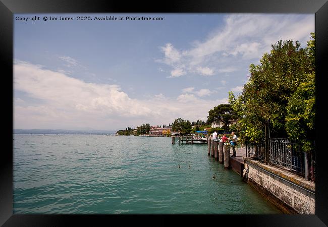 Sunny Lake Garda at Sirmione. Framed Print by Jim Jones
