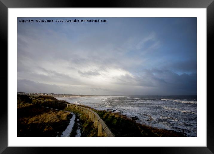 Winter sunshine at the coast Framed Mounted Print by Jim Jones