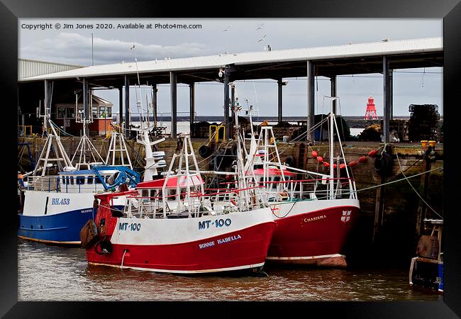 Fishing Boats safely tied up in harbour Framed Print by Jim Jones