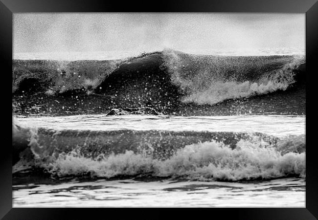 surfer paddling out Framed Print by Ian Jones