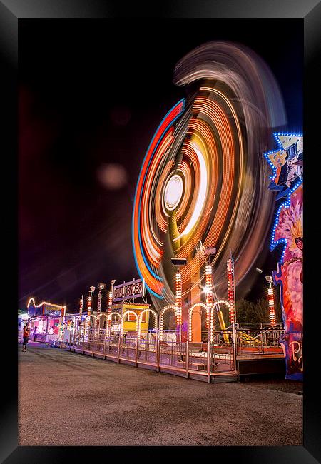 Fairground ride Framed Print by Ian Jones