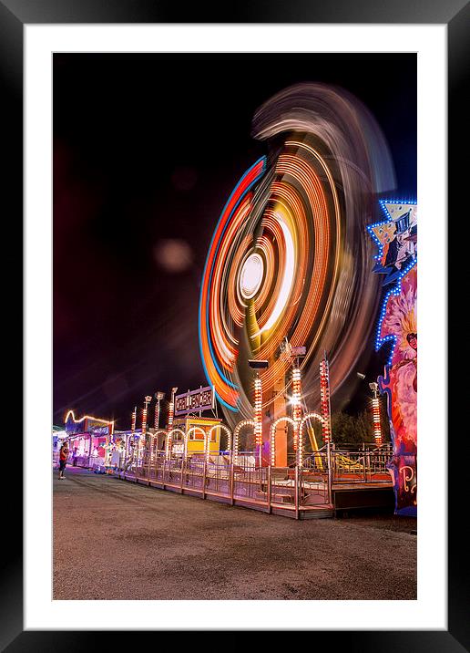 Fairground ride Framed Mounted Print by Ian Jones