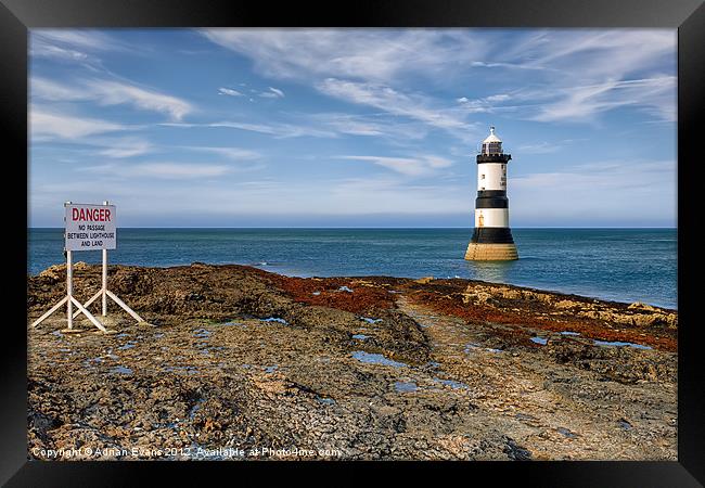 Penmon Point Lighthouse Framed Print by Adrian Evans
