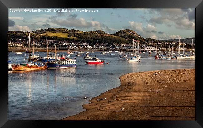 Boats In The Harbour Framed Print by Adrian Evans