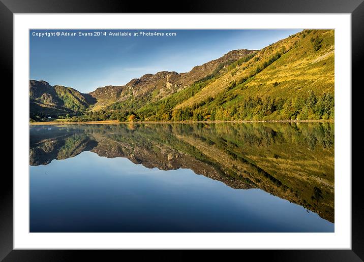 Cottage by the Lake Framed Mounted Print by Adrian Evans