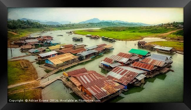Thai Floating Village Framed Print by Adrian Evans