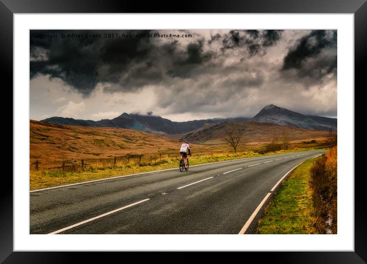 Cyclist Snowdonia Winter  Framed Mounted Print by Adrian Evans