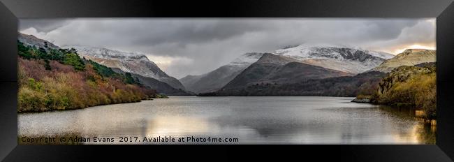 Winter at Padarn Lake Snowdonia Framed Print by Adrian Evans