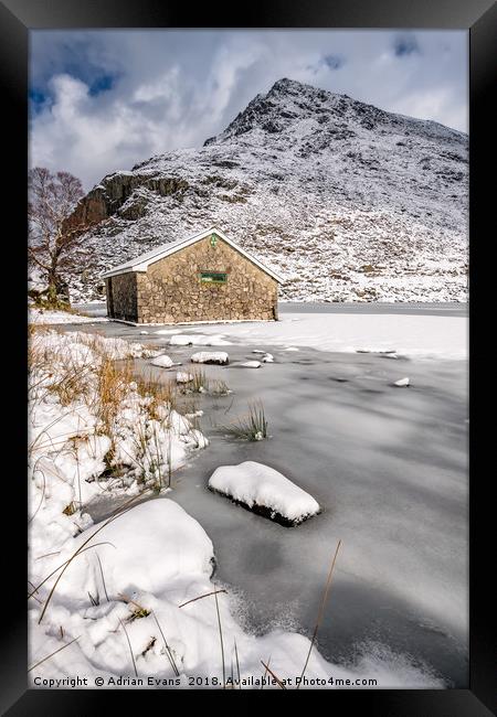 Frozen Ogwen Lake Snowdonia Framed Print by Adrian Evans