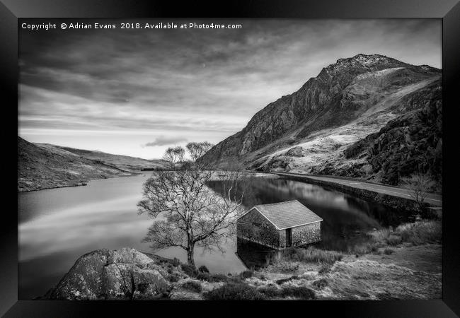 Lake and Half Moon Snowdonia  Framed Print by Adrian Evans