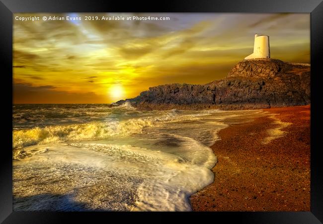 Twr Mawr Lighthouse Sunset Framed Print by Adrian Evans