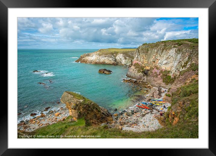 Rhoscolyn Bay Canoes Anglesey Wales Framed Mounted Print by Adrian Evans