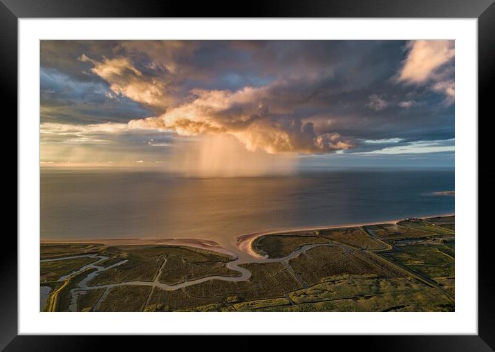 A sunset rain shower out at sea  Framed Mounted Print by Gary Pearson