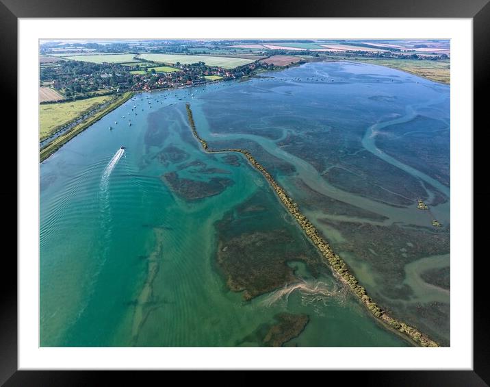 Burnham Overy Staithe and a high spring tide.  Framed Mounted Print by Gary Pearson