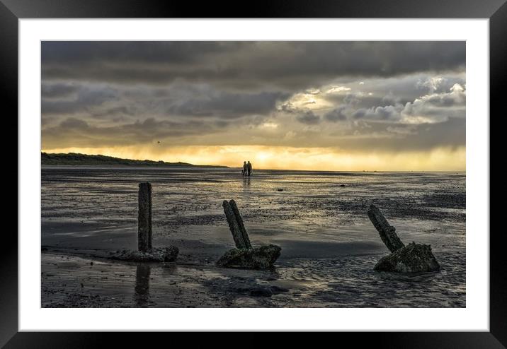 Blowing out the cobwebs - Holme next the Sea  Framed Mounted Print by Gary Pearson