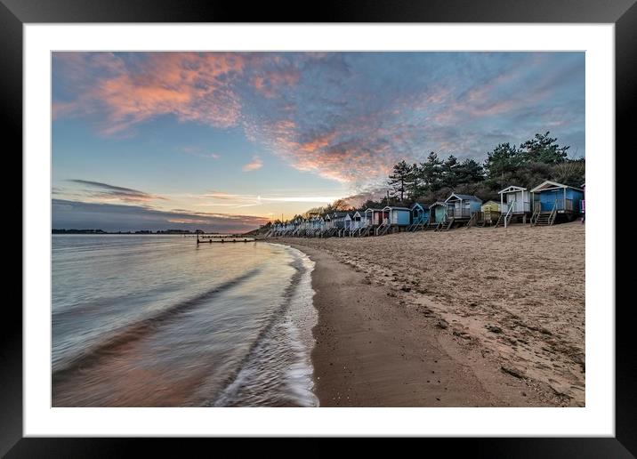 Beach huts at sunrise on beautiful Wells beach Framed Mounted Print by Gary Pearson