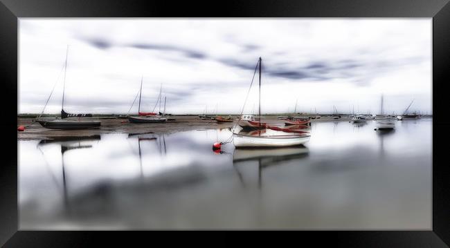 Low tide at Brancaster Staithe in Norfolk  Framed Print by Gary Pearson