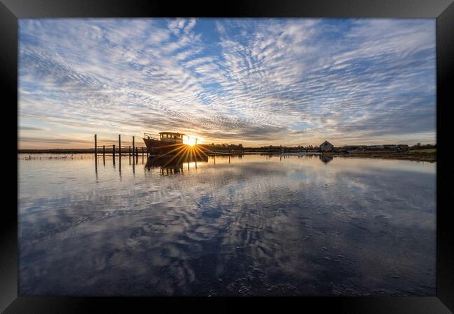 Sunrise reflections at Thornham Framed Print by Gary Pearson