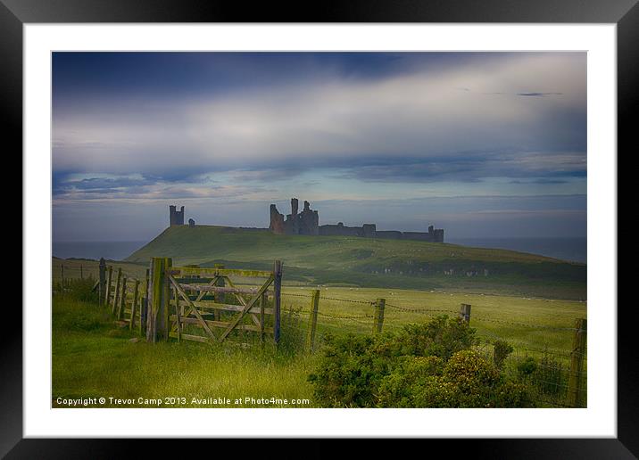 The Enchanting Ruins of Dunstanburgh Castle Framed Mounted Print by Trevor Camp
