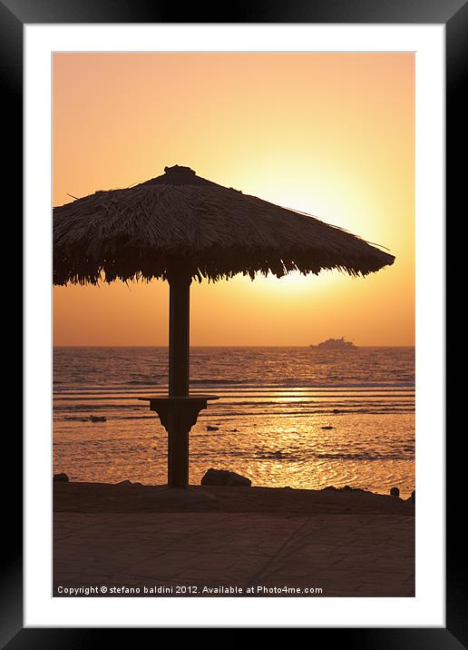 Sunrise with beach parasol, Dahab, Egypt Framed Mounted Print by stefano baldini