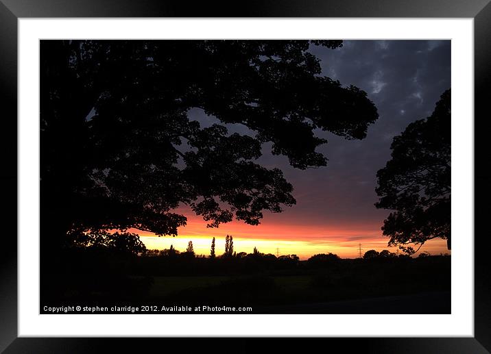 Sunset with tree silhouette Framed Mounted Print by stephen clarridge