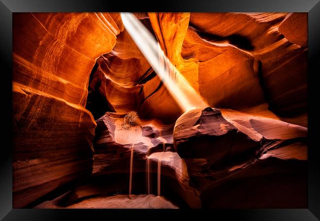 Sunbeam and falling sand in Antelope Canyon, Arizo Framed Print by Steven Clements LNPS